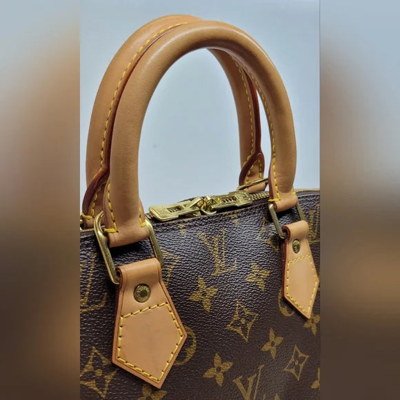 Louis Vuitton Brown Monogram Alma MM Handbag