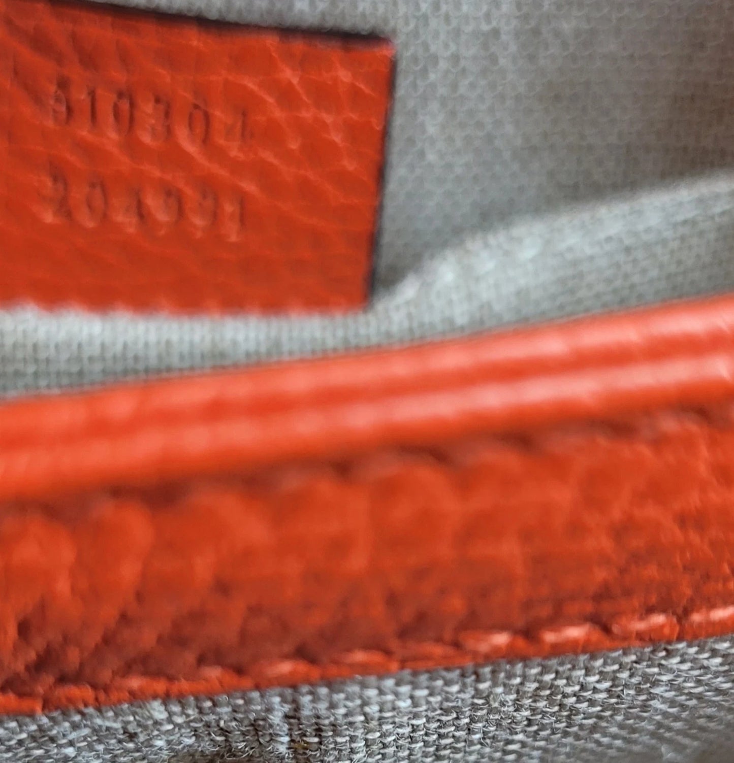 Gucci Dollar Orange Pebbled Leather Interlocking G Handbag