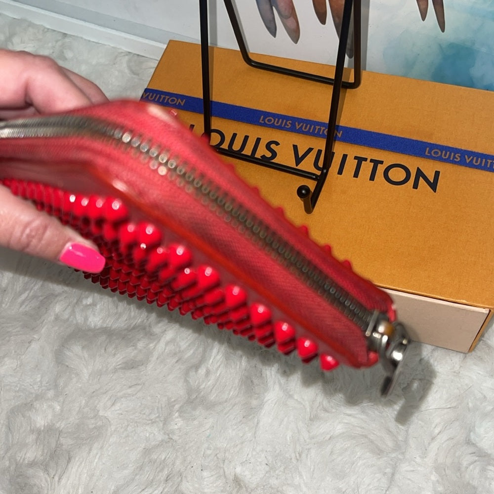 CHRISTIAN LOUBOUTIN
Spiked Long Zippy Wallet