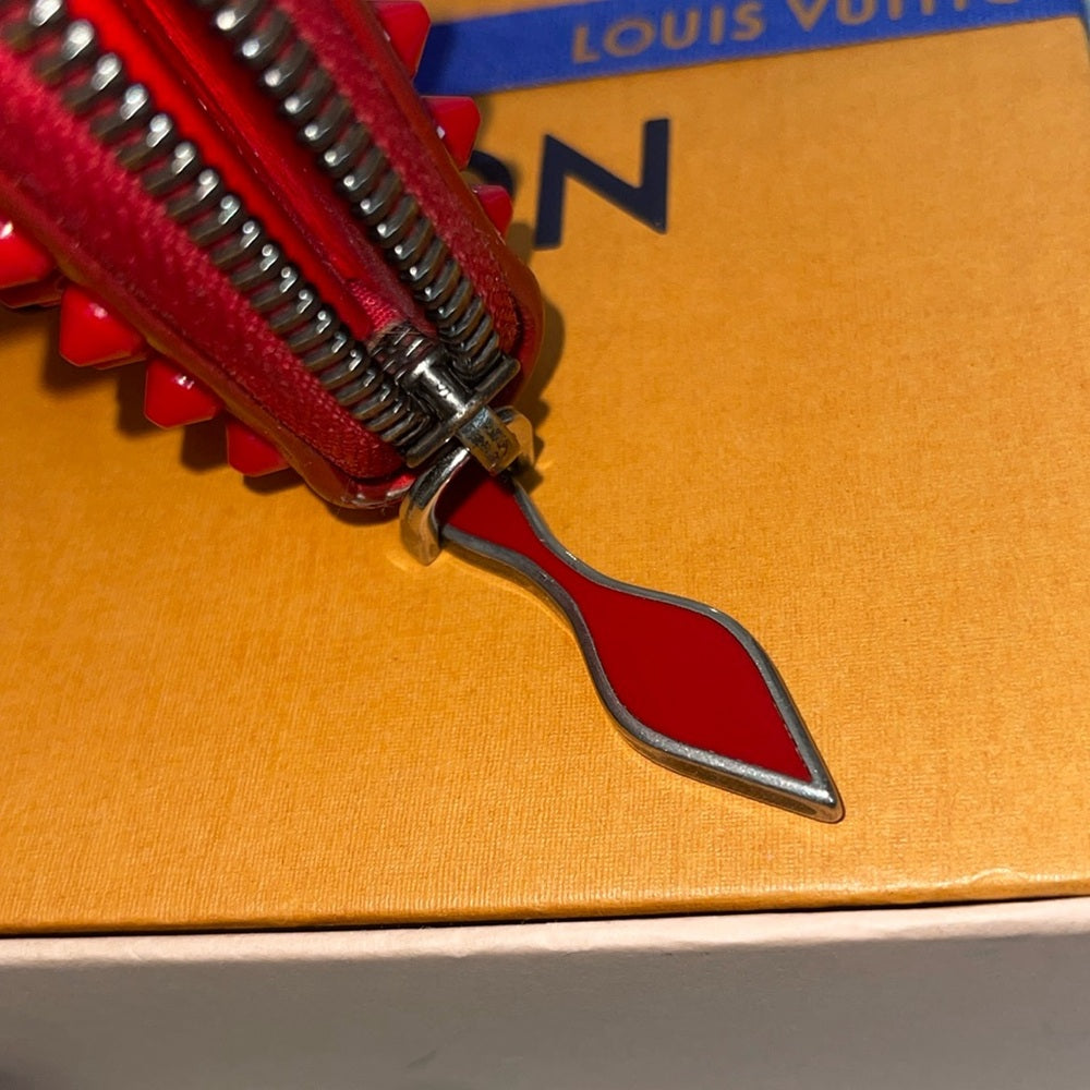 CHRISTIAN LOUBOUTIN
Spiked Long Zippy Wallet