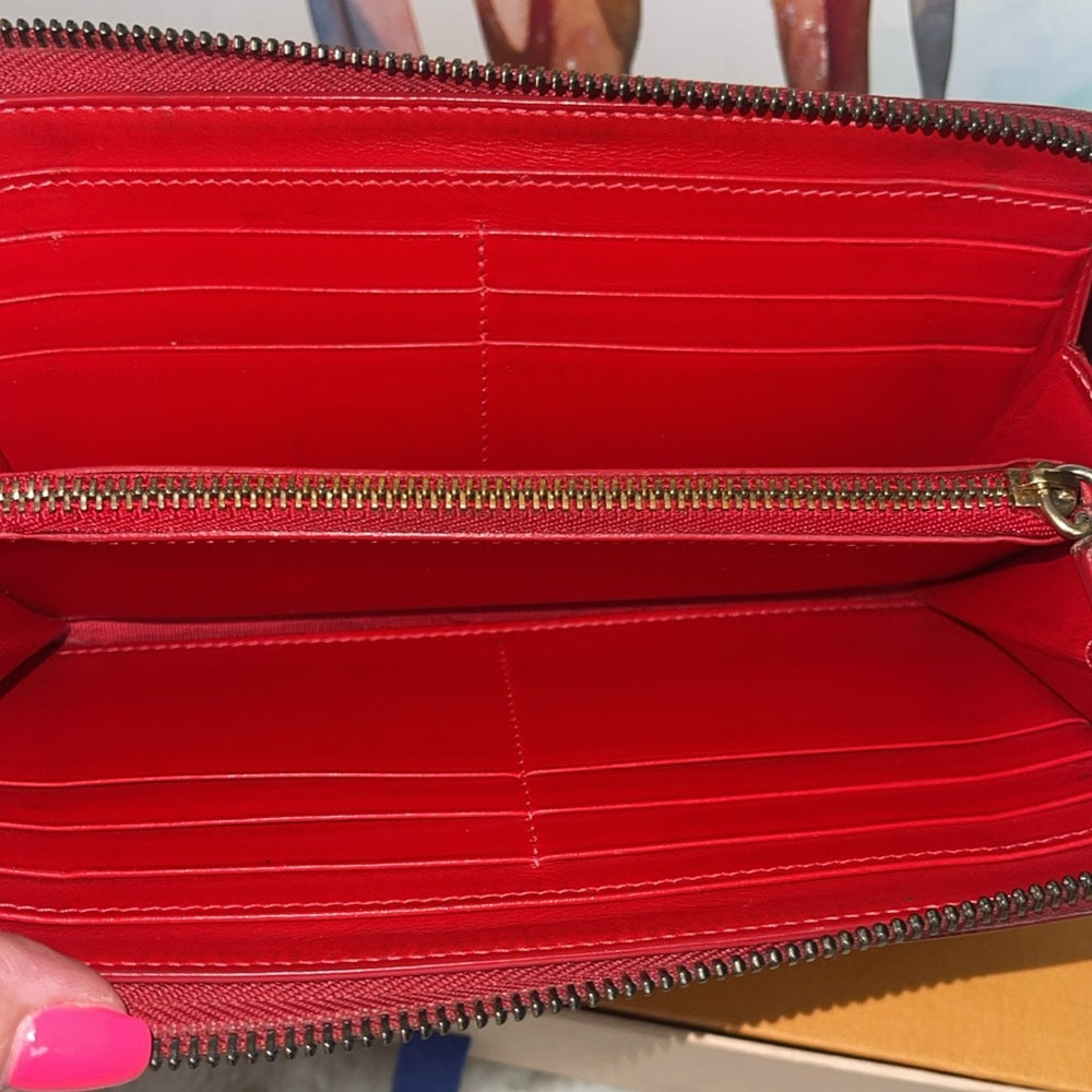 CHRISTIAN LOUBOUTIN
Spiked Long Zippy Wallet