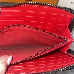 Beautiful Christian Louboutin long zippy spiked wallet