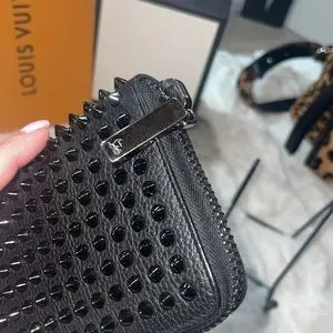 Beautiful Christian Louboutin long zippy spiked wallet