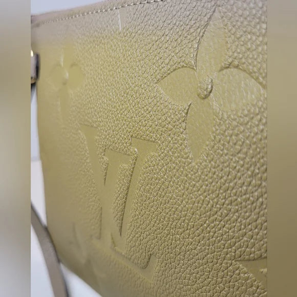SOLD! Louis Vuitton Giant Empreinte Neverfull Pouch
