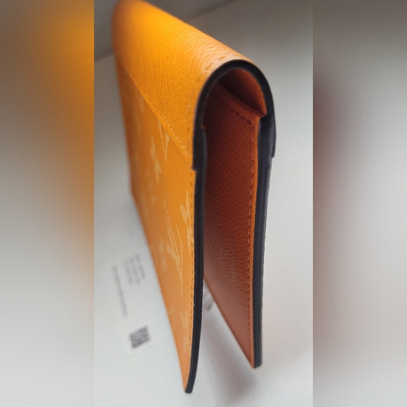 Louis Vuitton Taigarama Orange Leather Passport Cover