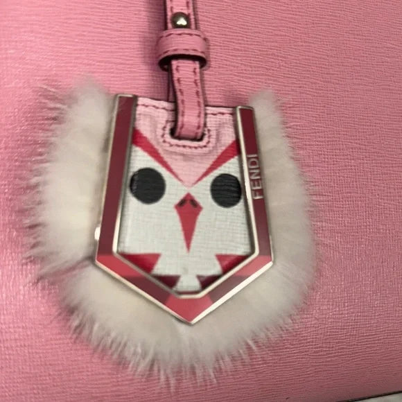 Fendi pink leather petite “2Jours” convertible tote bag with monster bag charm.