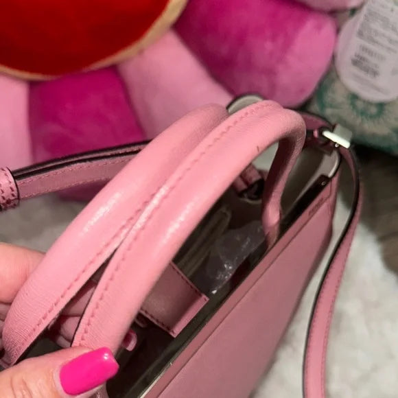 Fendi pink leather petite “2Jours” convertible tote bag with monster bag charm.
