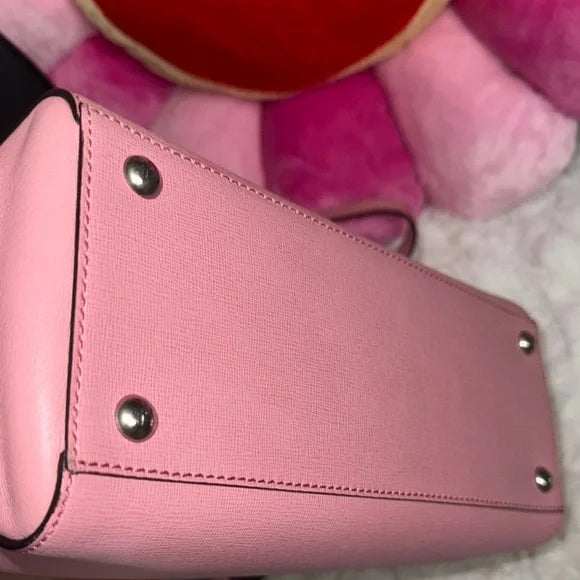 Fendi pink leather petite “2Jours” convertible tote bag with monster bag charm.