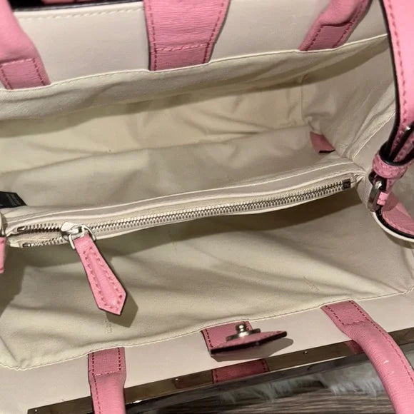 Fendi pink leather petite “2Jours” convertible tote bag with monster bag charm.
