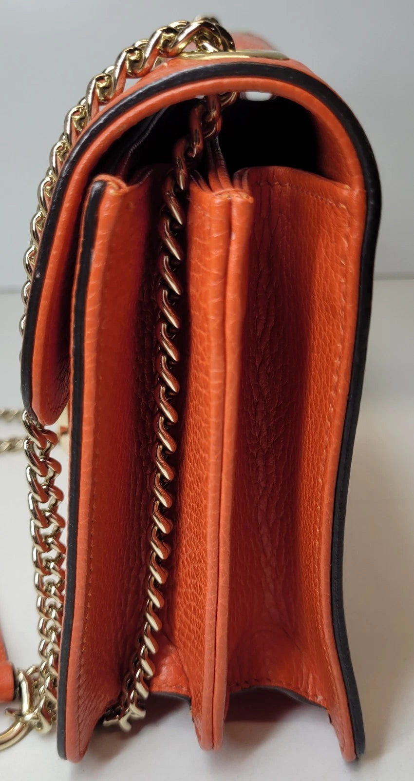 Gucci Dollar Orange Pebbled Leather Interlocking G Handbag
