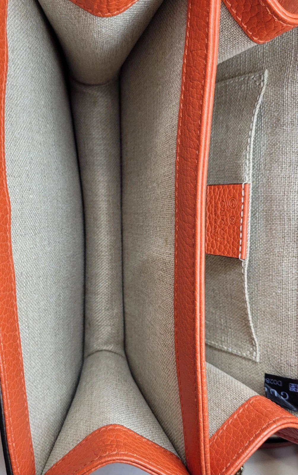 Gucci Dollar Orange Pebbled Leather Interlocking G Handbag