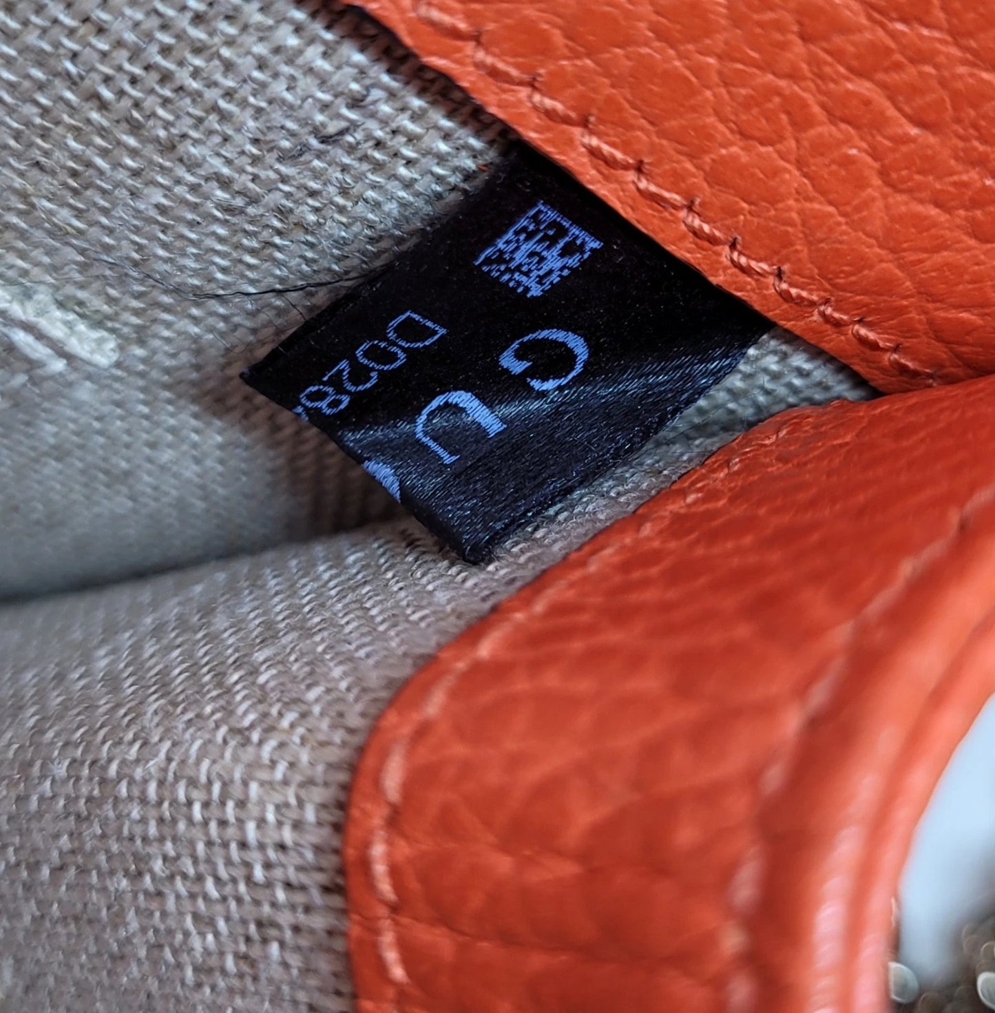 Gucci Dollar Orange Pebbled Leather Interlocking G Handbag