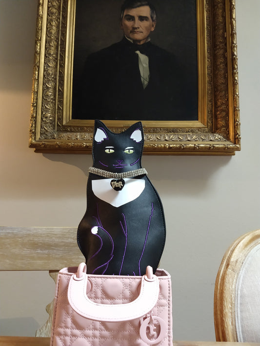 "TUXEDIO CAT OUT OF THE BAG"