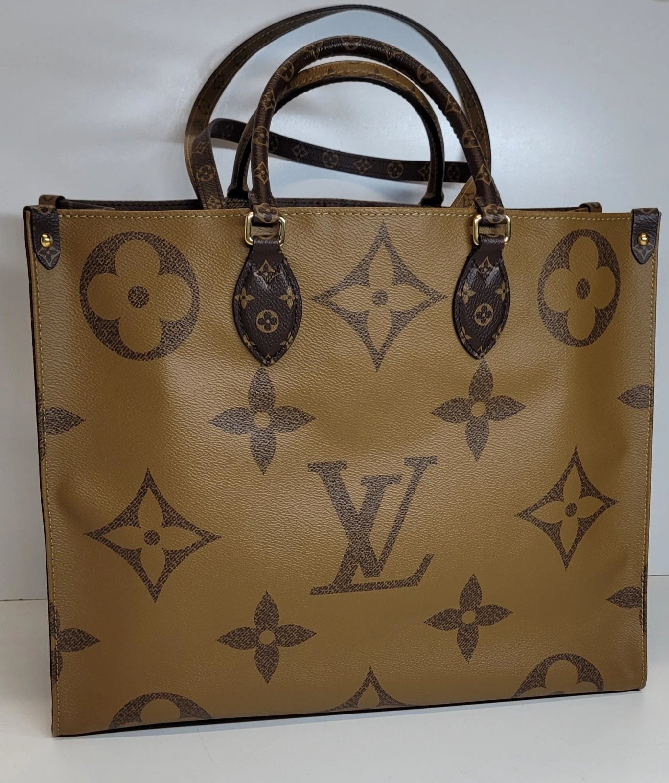 Louis Vuitton On The Go Reverse GM Tote Bag Plus Dustbag
