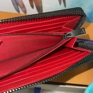 CHRISTIAN LOUBOUTIN spiked multi colored long zippy wallet