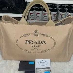 Excellent condition XL Prada Canapa tan tote with COA card