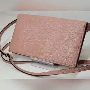 Pink Gucci pebbled leather crossbody bag